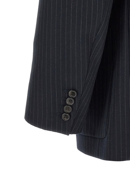 This Blazer by Saint Laurent for men in virgin wool & silk navy, patterned & pinstripe presents a tailored silhouette, meticulously tailored with a tailored and distinctive for a tailored finish.
