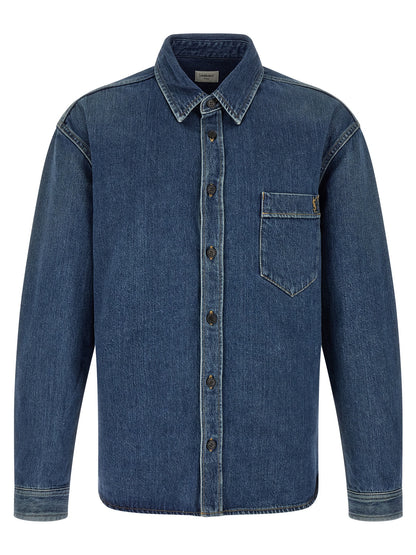 Shirt by Saint Laurent for men in denim cotton blue features an polished silhouette, showcasing a sophisticated and detail for a truly polished finish.