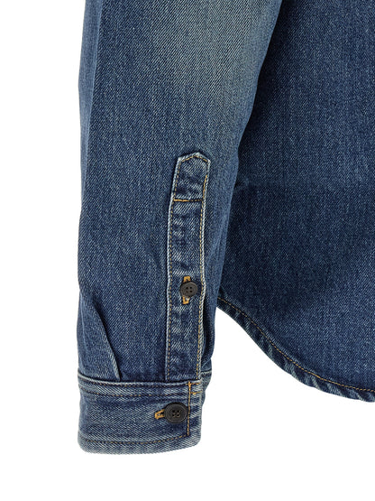 Shirt by Saint Laurent for men in denim cotton blue features an architectural silhouette with a refined and elegant for a architectural look.