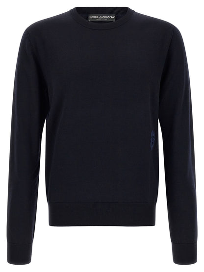 Cardigan by Dolce & Gabbana for men in virgin wool navy features a nuanced silhouette with a refined and nuanced detailing for a sophisticated look.