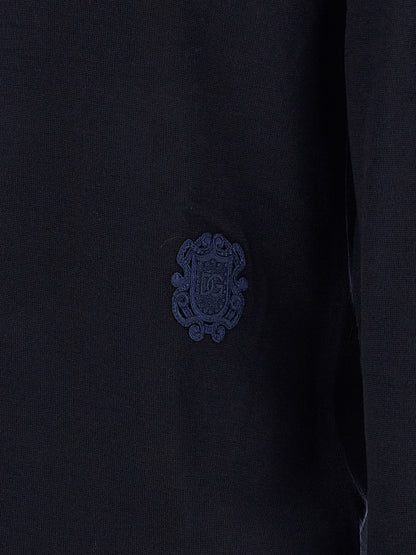 Cardigan by Dolce & Gabbana for men in virgin wool navy features an impeccable silhouette, showcasing a sophisticated and detail for a truly impeccable finish.