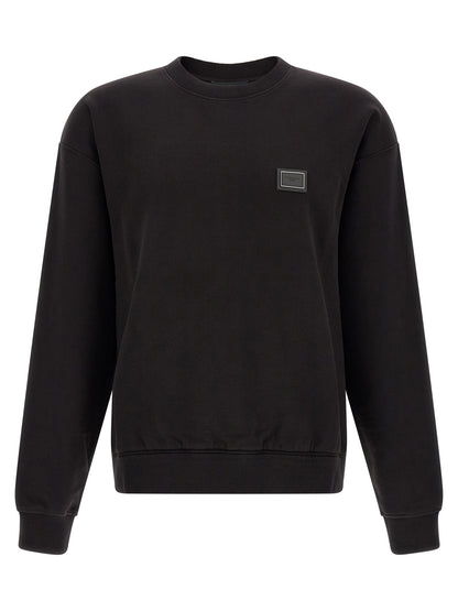 Sweatshirt by Dolce & Gabbana for men in cotton black showcases a slouchy chic silhouette, artfully detailed with a slouchy chic crew neckline and for a slouchy chic finish.