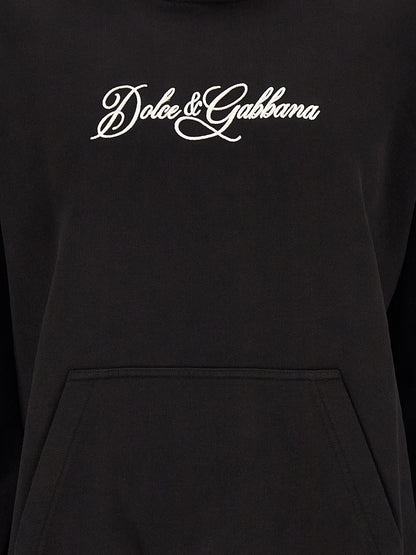 Sweatshirt by Dolce & Gabbana for men in cotton black features an provocated silhouette, detailed with a provocated and a refined for a sophisticated aesthetic.