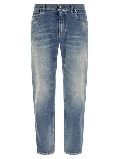 Jeans by Dolce & Gabbana for men in stretch denim cotton blue features an sophisticated low rise and straight-leg with a precise long, creating a sophisticated and sophisticated silhouette.
