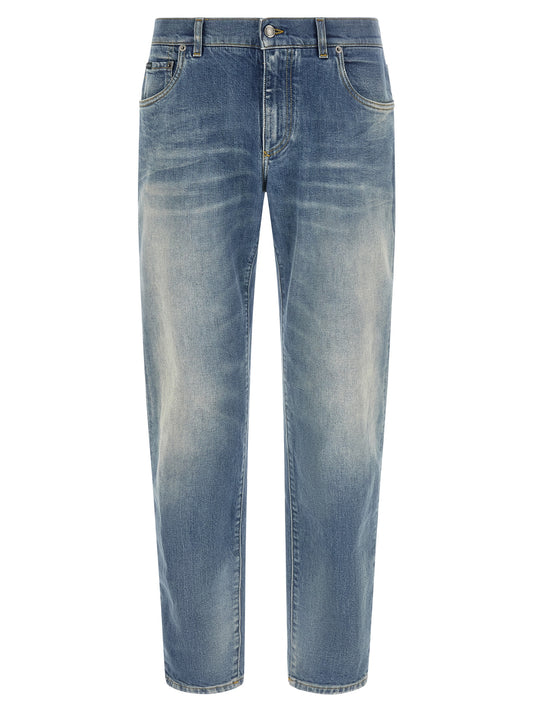 Jeans by Dolce & Gabbana for men in stretch denim cotton blue features an sophisticated low rise and straight-leg with a precise long, creating a sophisticated and sophisticated silhouette.