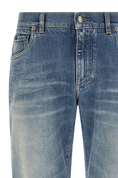 Jeans by Dolce & Gabbana for men in stretch denim cotton blue features an refined tailoring silhouette, showcasing a premium straight-leg with a low rise and long cut for a refined tailoring look.