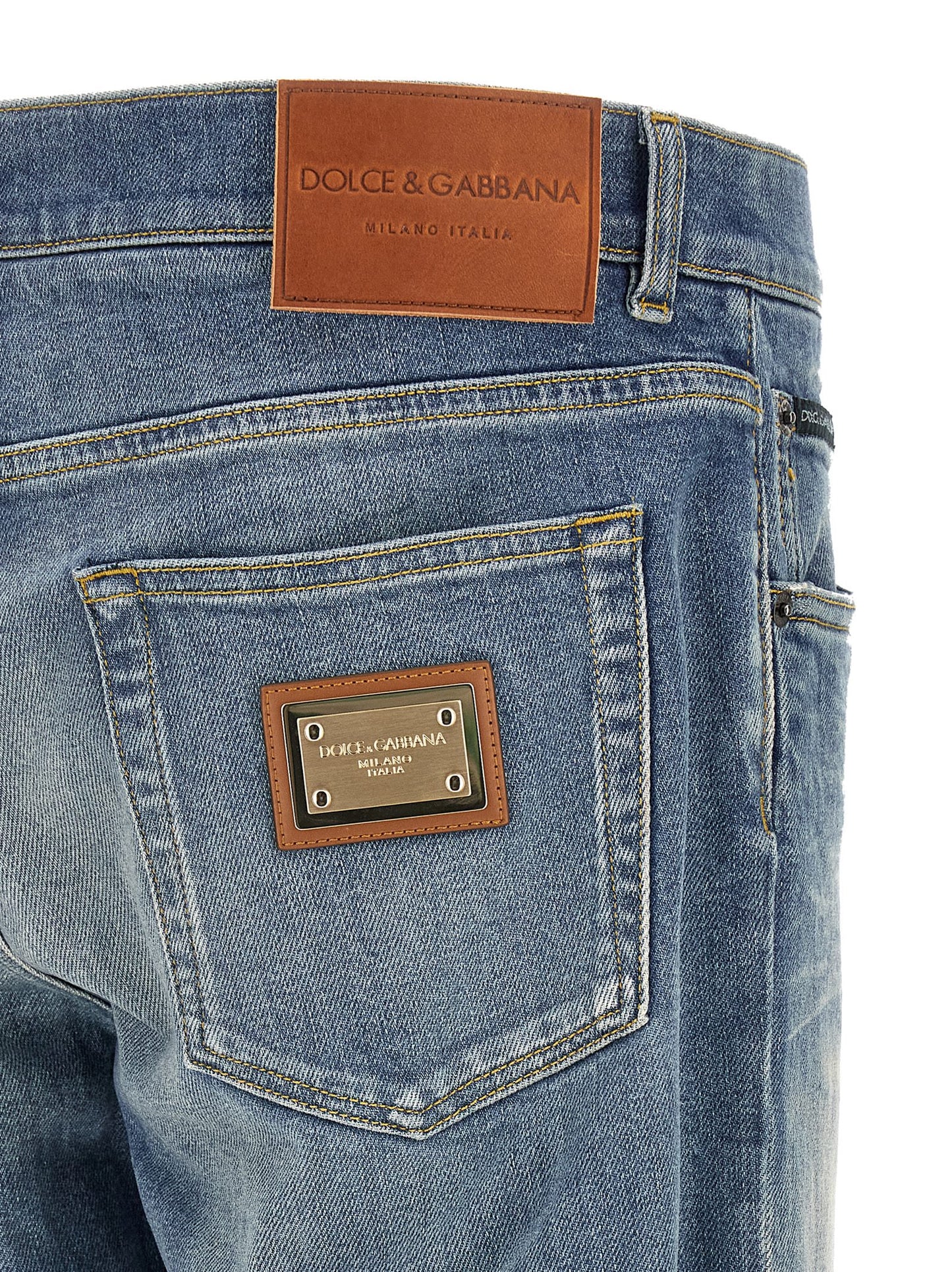Jeans by Dolce & Gabbana for men in stretch denim cotton blue presents a refined pantology silhouette, artfully defined by a refined pantology straight-leg, long, and a sophisticated low rise.