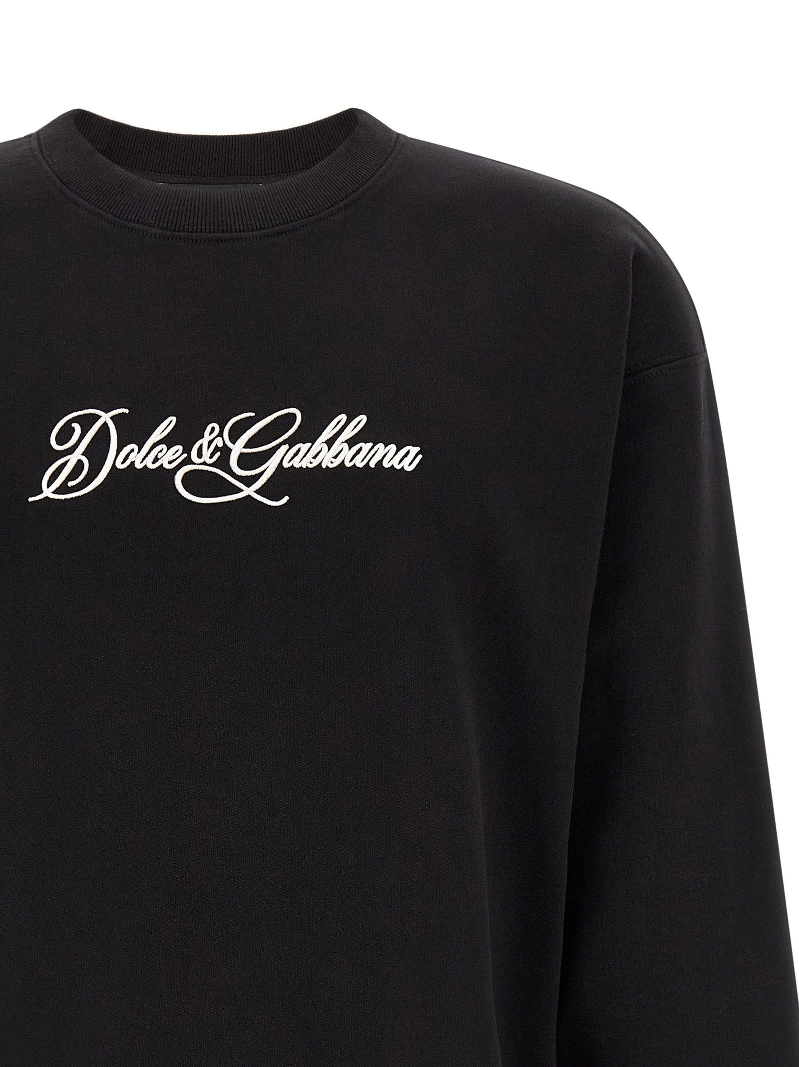 Sweatshirt by Dolce & Gabbana for men in cotton black features an provocated silhouette, detailed with a provocated and a refined for a sophisticated aesthetic.