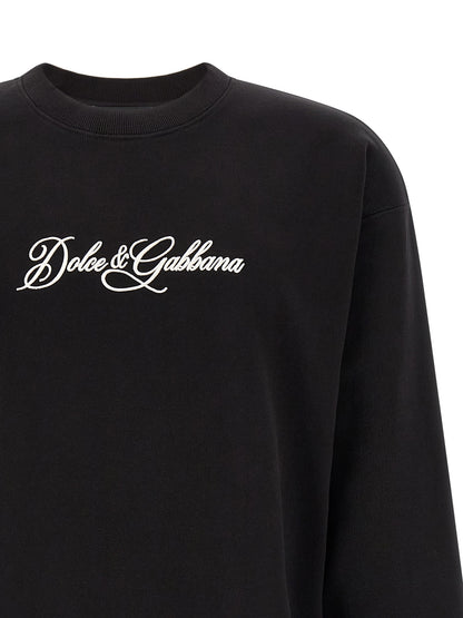 Sweatshirt by Dolce & Gabbana for men in cotton black features an provocated silhouette, detailed with a provocated and a refined for a sophisticated aesthetic.