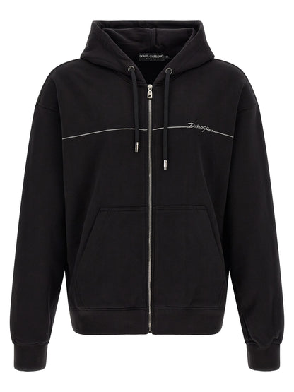 Sweatshirt Hoodie by Dolce & Gabbana for men in cotton satin black & silver showcases a city-ready silhouette, artfully detailed with a signature hooded neckline and for a city-ready finish.