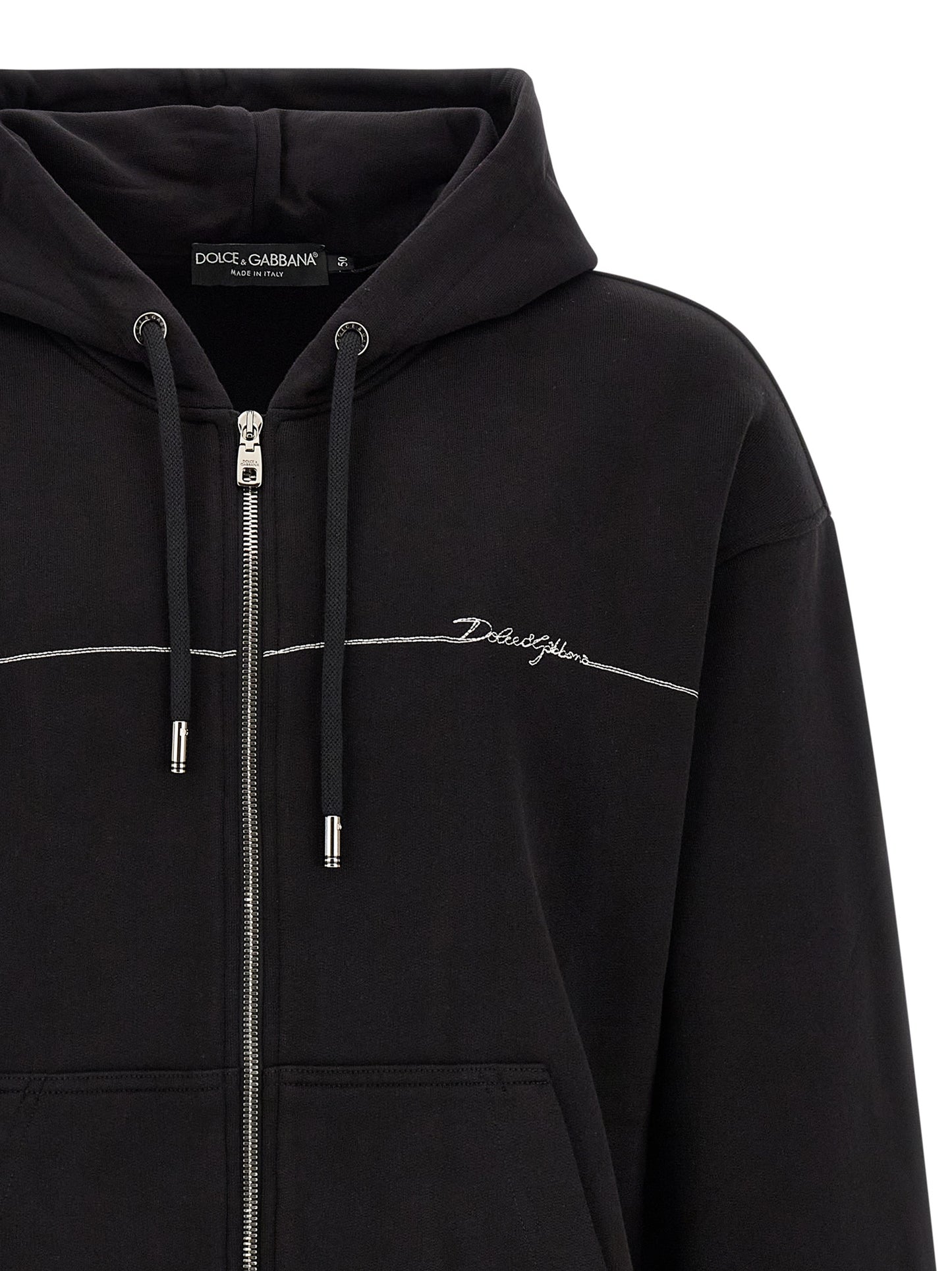 Sweatshirt Hoodie by Dolce & Gabbana for men in cotton satin black & silver features a slouchy chic silhouette, detailed with a slouchy chic and a signature hooded neckline for an elevated aesthetic.