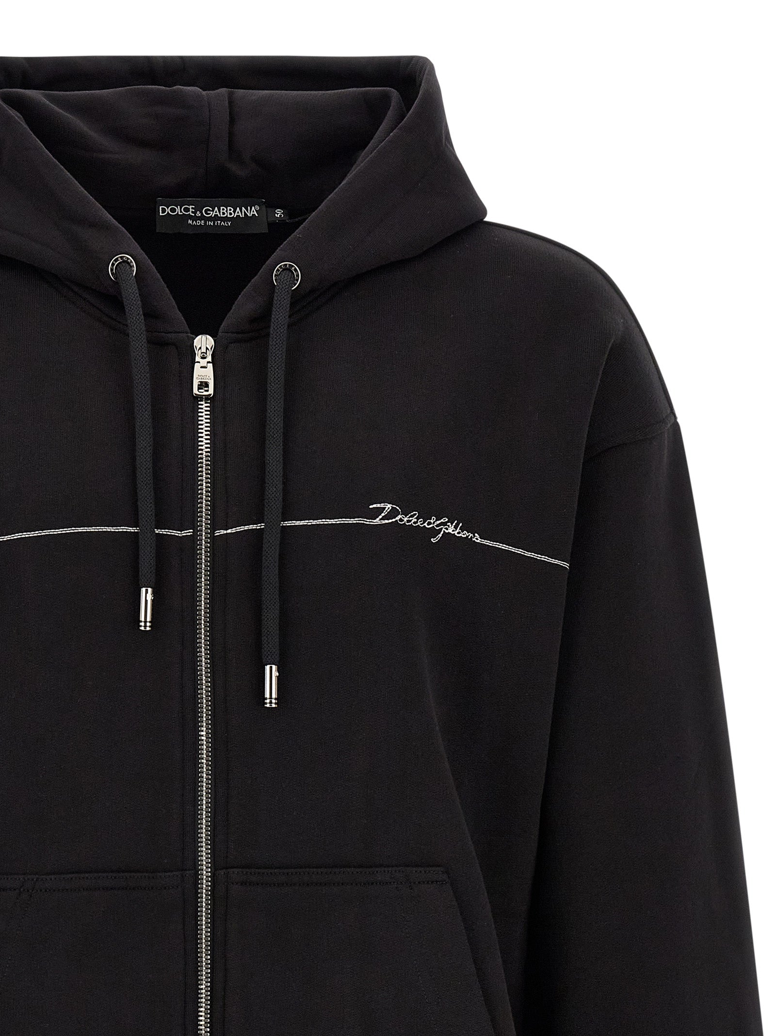 Sweatshirt Hoodie by Dolce & Gabbana for men in cotton satin black & silver features a slouchy chic silhouette, detailed with a slouchy chic and a signature hooded neckline for an elevated aesthetic.