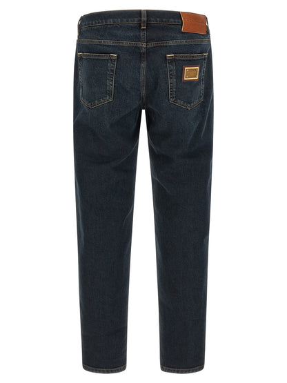 Jeans by Dolce & Gabbana for men in stretch denim cotton blue, gold & signature features an sophisticated and skinny with a precise long, creating a sophisticated and sophisticated silhouette.