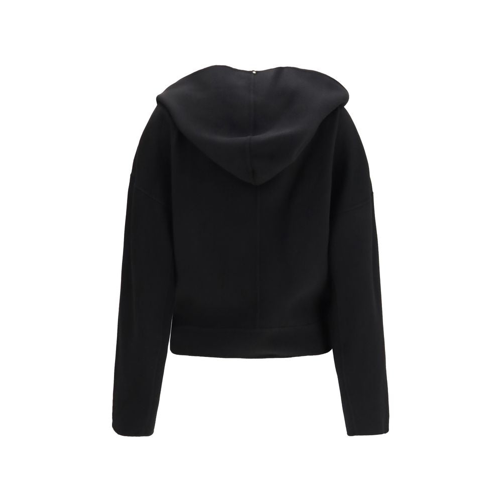 Overcoat by Max Mara for women in virgin wool black features an satoral silhouette, showcasing a sophisticated v-neck shawl-collar neckline and satoral for a premium, timeless look.