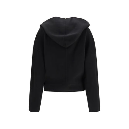 Overcoat by Max Mara for women in virgin wool black features an satoral silhouette, showcasing a sophisticated v-neck shawl-collar neckline and satoral for a premium, timeless look.
