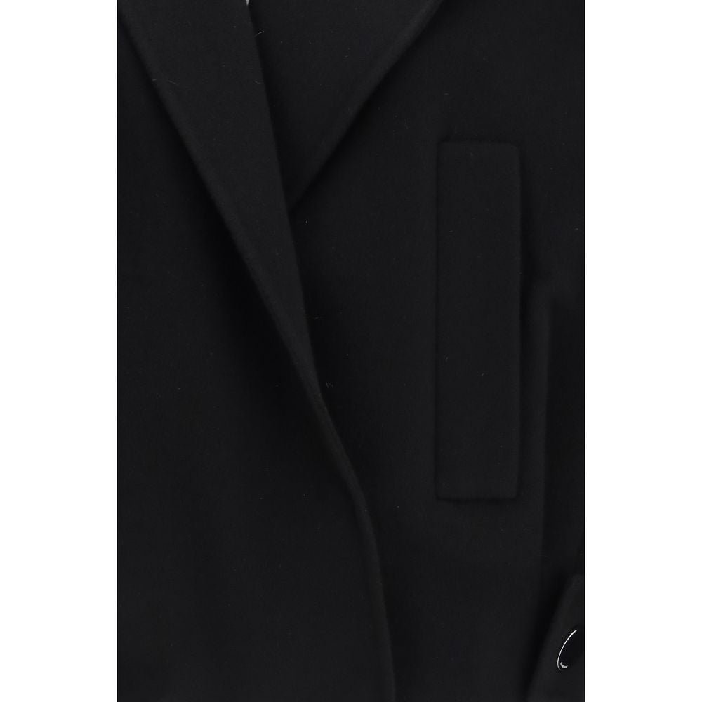 Overcoat by Max Mara for women in virgin wool black showcases a architectural silhouette, artfully detailed with a distinctive and functional for a architectural finish.