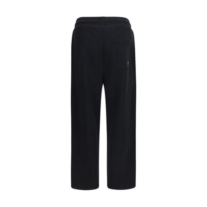 Jogger Sweatpants by Ami Paris for men in cotton black features an kinetic relaxed-fit, regular-fit & wide and long with a , showcasing high-performance for an kinetic look.