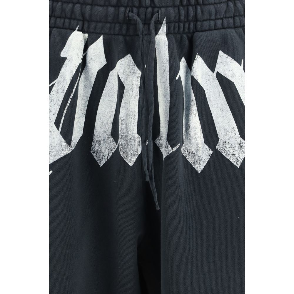 Jogger Sweatpants by Palm Angels for men in cotton gray & print features a contemporary silhouette with , a contemporary relaxed-fit, regular-fit & wide, long hem, and for a premium, high-performance aesthetic.