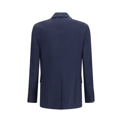 Overcoat by Vivienne Westwood for men in wool blue, jacquard & signature features a contemporary silhouette showcasing a contemporary and refined pockets for a sophisticated finish.