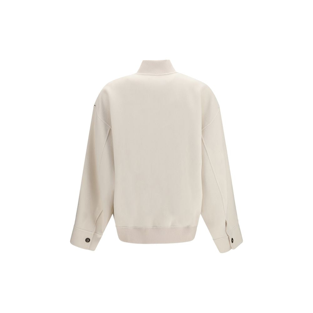 Overcoat by Max Mara for women in virgin wool beige showcases a architectural silhouette, artfully detailed with a distinctive and functional pockets for a architectural finish.