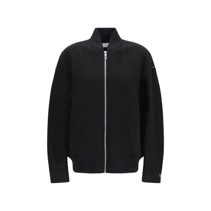 Overcoat by Max Mara for women in virgin wool black features an voluminous silhouette, showcasing distinct pockets and a voluminous for a truly voluminous aesthetic.