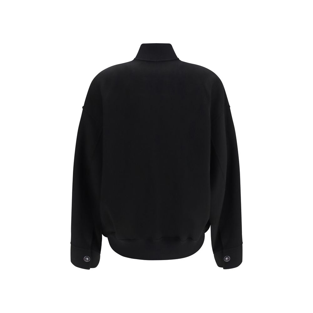 Overcoat by Max Mara for women in virgin wool black features an satoral silhouette, showcasing a sophisticated and satoral pockets for a premium, timeless look.
