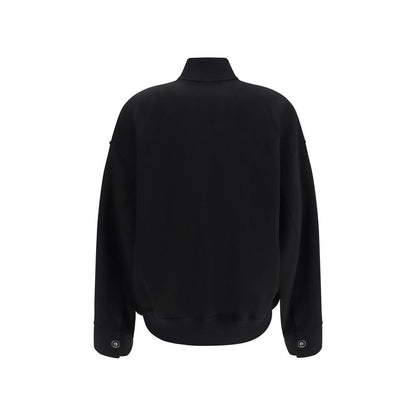 Overcoat by Max Mara for women in virgin wool black features an satoral silhouette, showcasing a sophisticated and satoral pockets for a premium, timeless look.