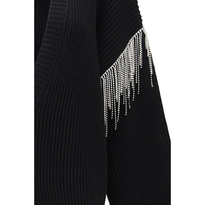 Cardigan by Max Mara for women in virgin wool black features a nuanced silhouette with a refined and nuanced detailing for a sophisticated look.