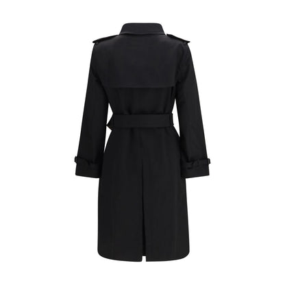 Trench Coat by Burberry for women in cotton beige & black presents a distinguished silhouette, artfully detailed with pockets and a distinguished for a sophisticated, distinguished finish.