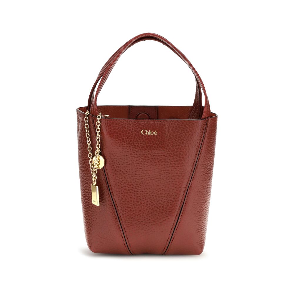 Shoulder Bag by Chloé for women in bos taurus grained leather multicolor & monogram features a effortless chic silhouette with a secure magnetic & button, ample single-compartment, and versatile shoulder-strap, handle & adjustable-strap for a effortless chic finish.