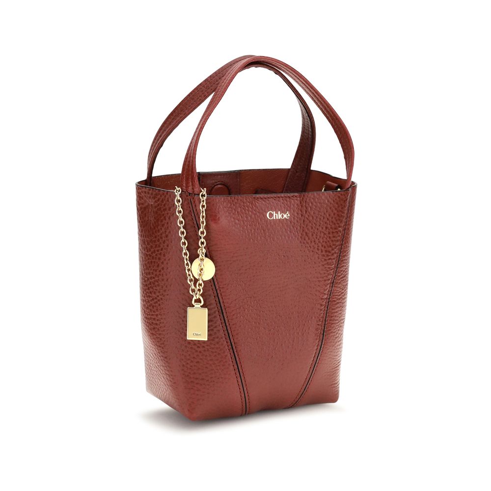Shoulder Bag by Chloé for women in bos taurus grained leather multicolor & monogram presents a versatile silhouette, showcasing a secure magnetic & button and versatile single-compartment with versatile shoulder-strap, handle & adjustable-strap for a sophisticated look.