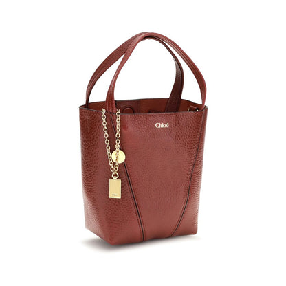 Shoulder Bag by Chloé for women in bos taurus grained leather multicolor & monogram presents a versatile silhouette, showcasing a secure magnetic & button and versatile single-compartment with versatile shoulder-strap, handle & adjustable-strap for a sophisticated look.