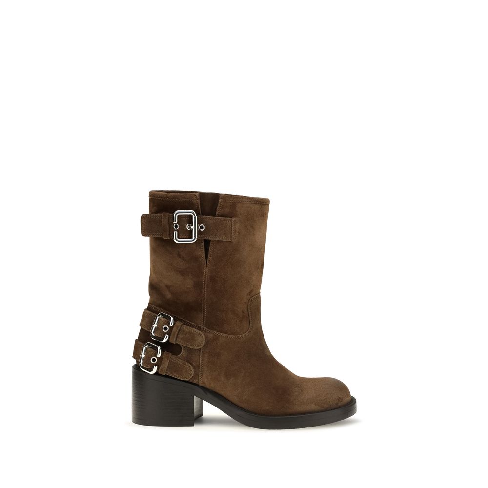Ankle Boots by Chloé for women in bos taurus calf suede leather brown & gold showcases a impeccable silhouette as Women's Bos Taurus Calf Suede Leather Ankle Boots, artfully defined by a impeccable block-heel and a impeccable .