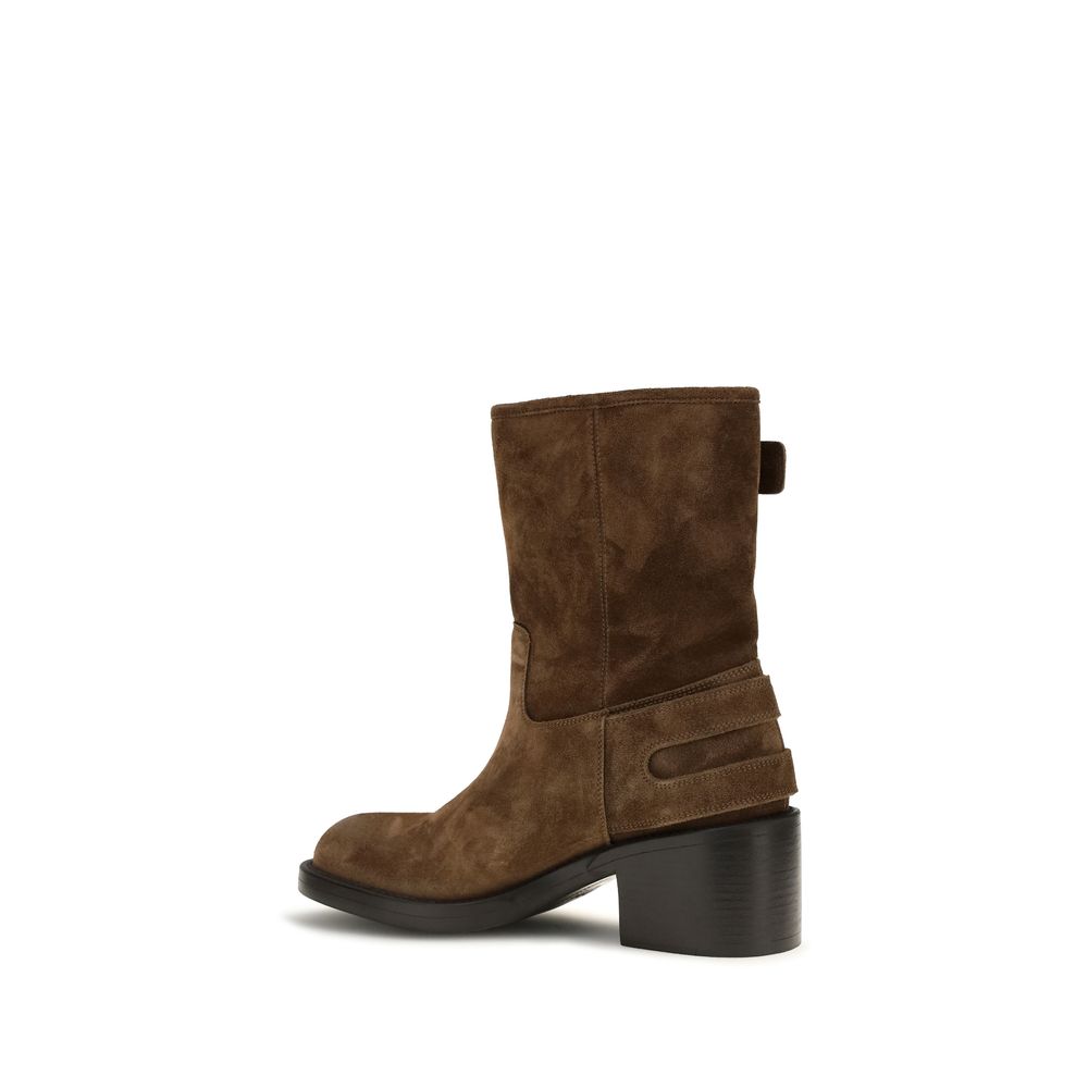 Ankle Boots by Chloé for women in bos taurus calf suede leather brown & gold features an enchanting design from the Women's Bos Taurus Calf Suede Leather Ankle Boots collection, highlighting a enchanting block-heel and for a refined look.