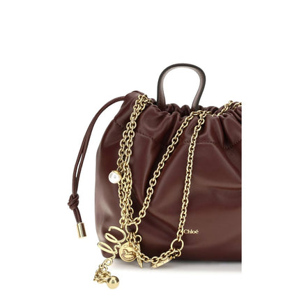 Compact Drawstring Shoulder Bag by Chloé for women in bos taurus nappa leather gold & signature features a enviable silhouette, showcasing a secure drawstring, ample , and enviable shoulder-strap & handle for a enviable finish.