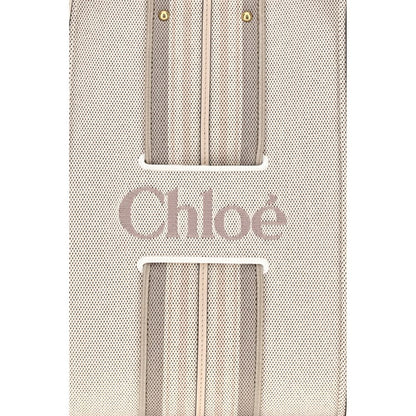 Shoulder Tote Bag by Chloé for women in cotton canvas & calf leather beige & striped showcases a enviable silhouette, artfully detailed with a secure magnetic, organized , and versatile shoulder-strap & belt-strap for a enviable look.