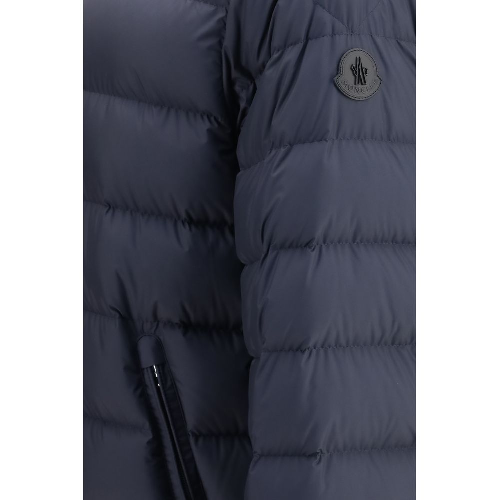 Hooded Puffer Jacket by Moncler for men in polyester nylon leather & goose-down blue showcases a bohemian silhouette, artfully detailed with a bohemian and signature lightweight, pockets, hooded & insulated for a truly bohemian finish.