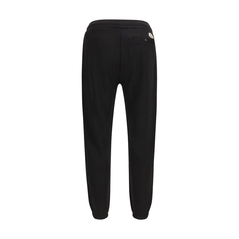 Sweatpants by Moncler for men in polyester cotton nylon & modal black features an streamlined design with , highlighting a streamlined athletic & regular-fit and long cut with a comfortable .
