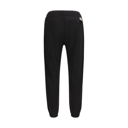 Sweatpants by Moncler for men in polyester cotton nylon & modal black features an streamlined design with , highlighting a streamlined athletic & regular-fit and long cut with a comfortable .