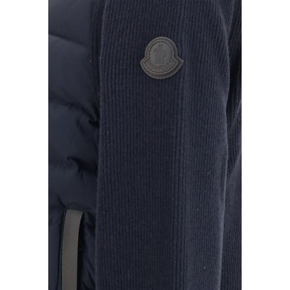 Cardigan by Moncler for men in cashmere wool capra leather & duck down blue showcases a captivating silhouette, artfully detailed with a captivating and for a truly sophisticated captivating look.