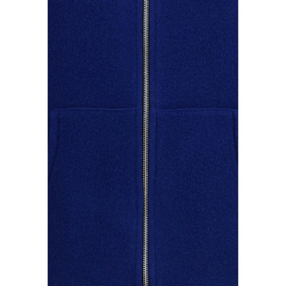 Vest by RIER for women in virgin wool blue showcases a utilitarian silhouette, artfully incorporating pockets and a utilitarian for a truly utilitarian finish.