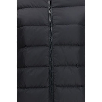This Hooded Puffer Jacket by Herno for women in polyester black exhibits a edgy silhouette, meticulously detailed with functional pockets, hooded & insulated and a edgy hooded neckline for a edgy finish.