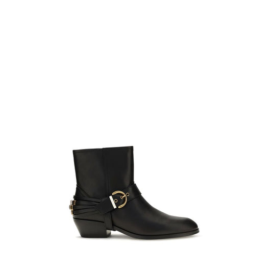 Ankle Strap Boots by PINKO for women in bos taurus calf leather black features an enchanting design from the Women's Bos Taurus Calf Leather Ankle Strap Boots collection, highlighting a enchanting and oval toe style for a refined look.