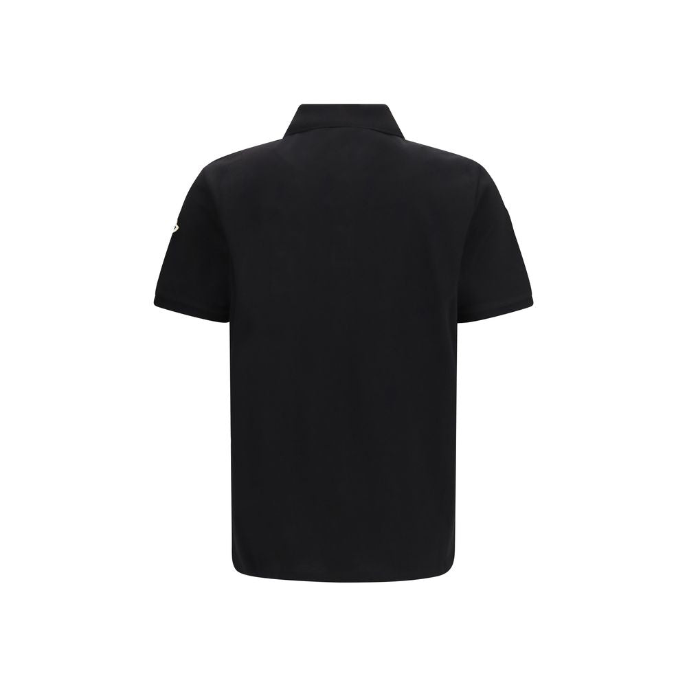 Polo Shirt by Moncler for men in cotton black presents a distinguished silhouette, showcasing a sophisticated and distinguished for a truly distinguished finish.