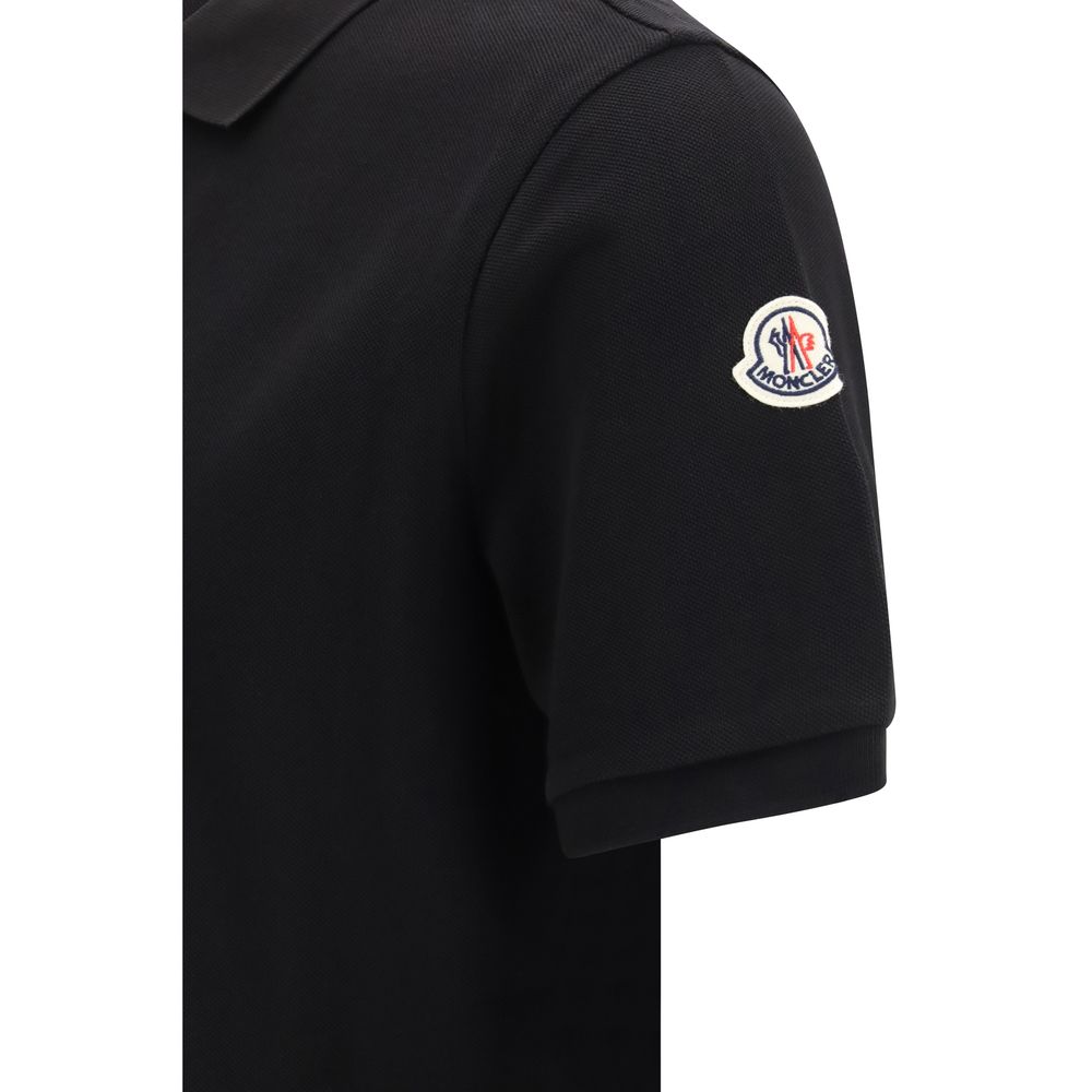 Polo Shirt by Moncler for men in cotton black presents a crisp silhouette, artfully detailed with a crisp and crisp .
