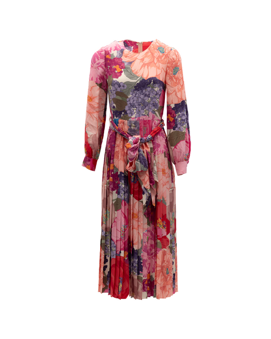 Dress by Valentino Garavani for women in silk green, orange, pink, purple & floral features an cute silhouette, detailed with a long-sleeve and that elegantly flows into a cute midi.