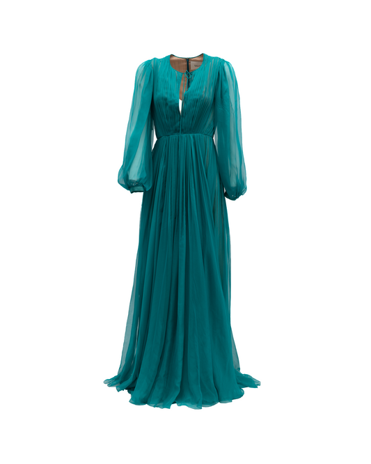 Dress by Valentino Garavani for women in lace teal features an sultry silhouette defined by a and long-sleeve, falling to an sultry long for a sultry look.