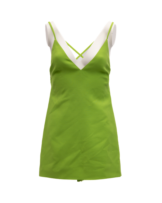 Dress by Valentino Garavani for women in lace green presents a sinuous silhouette, showcasing a sophisticated and detailed with a sinuous short for a refined finish.
