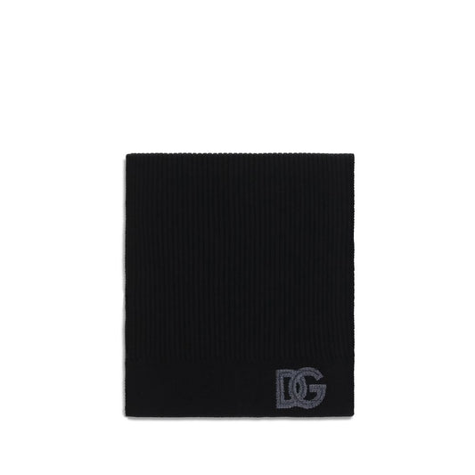 Scarf by Dolce & Gabbana for men in virgin wool black showcases a eye catching silhouette, artfully capturing the essence of the eye catching Virgin Wool Fringes Scarf design for a sophisticated look.