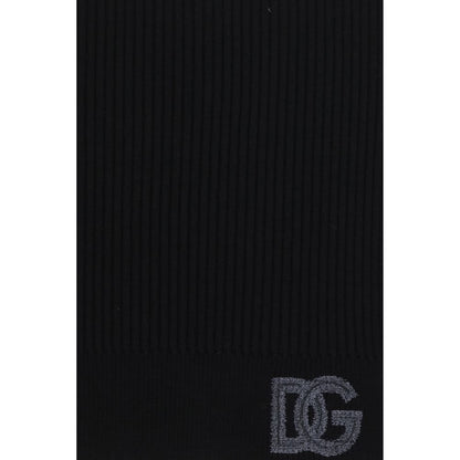 Scarf by Dolce & Gabbana for men in virgin wool black showcases a eye catching silhouette, artfully capturing the essence of the eye catching Virgin Wool Fringes Scarf design for a sophisticated look.